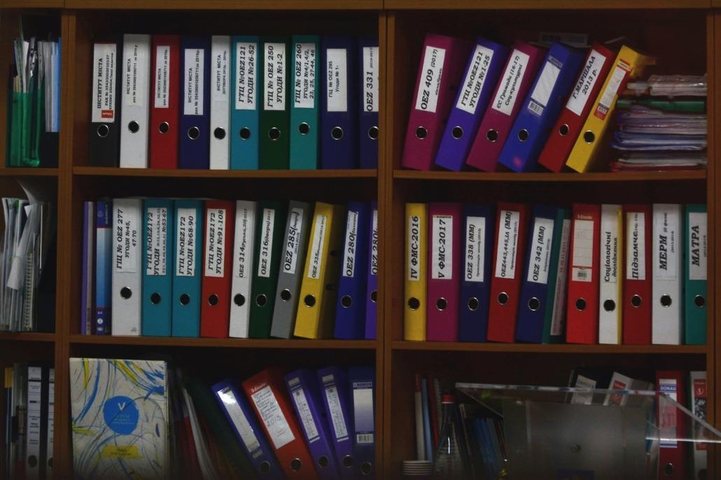 a large cabinet with lots of files 