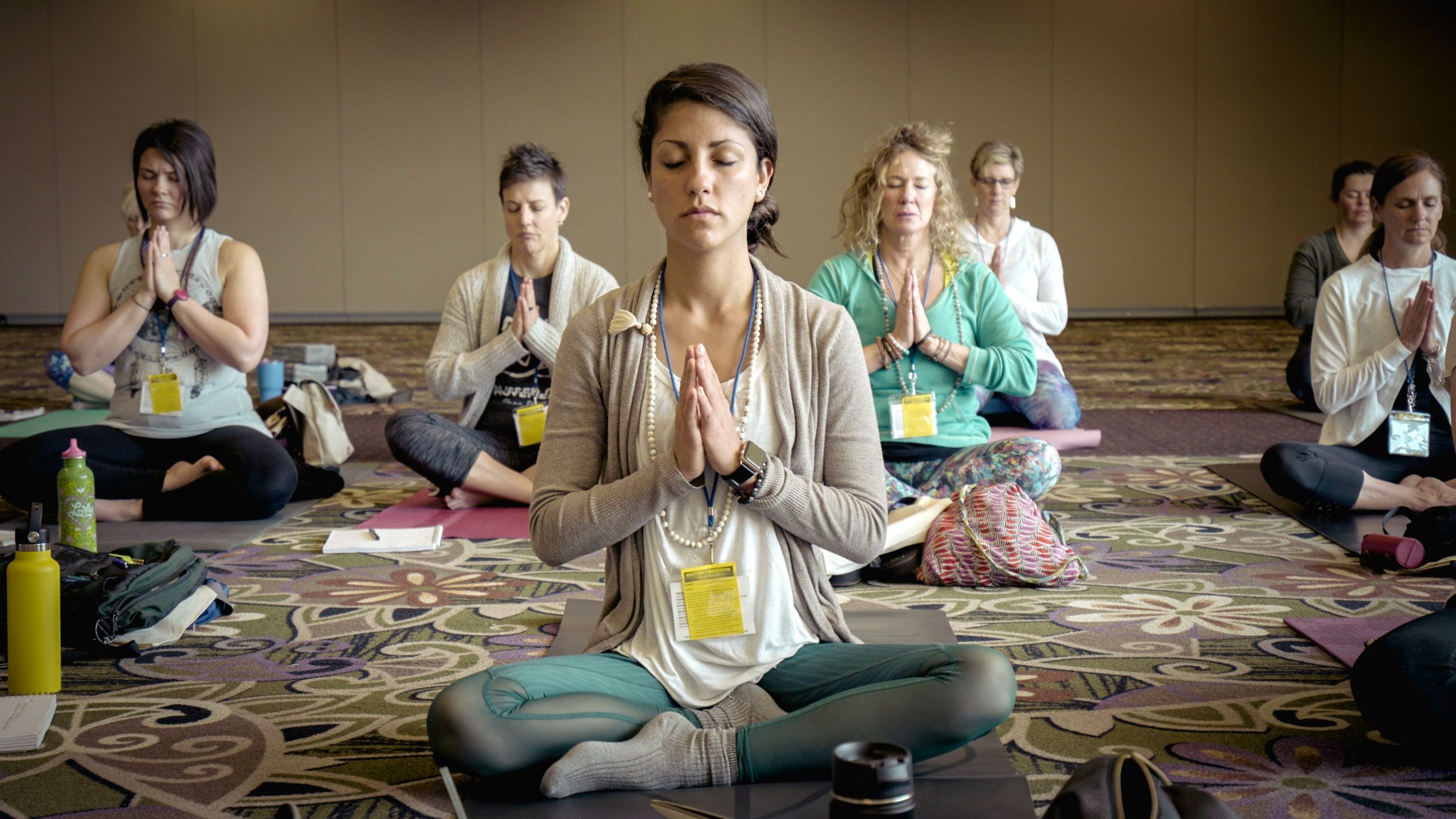 yoga class led by instructor